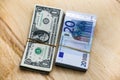 Euros and dollars on table Royalty Free Stock Photo