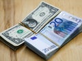 Euros and dollars on table Royalty Free Stock Photo