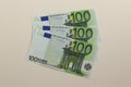 300 euros lying on a light surface. Three paper banknotes of 100 euros each. Royalty Free Stock Photo