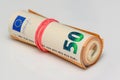 euros rolled into a tube, 50 euro bills on a white background 15 Royalty Free Stock Photo
