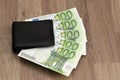 500 euros sticking out of the wallet. Five paper banknotes of 100 euros each. Royalty Free Stock Photo