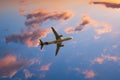 Eurowings airbus plane flies through pink clouds in the blue evening sky Royalty Free Stock Photo