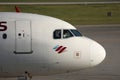 Eurowings plane taxiing on taxiway, cabin crew close-up