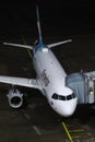 Eurowings plane at the terminal, night view