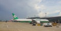 EVA Air airplane docking at the airport in Saigon, Vietnam