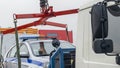 Evacuation of the broken police car with red and blue flasher. A broken police car stands on a tow truck Royalty Free Stock Photo