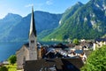 Evangelical parish church in Hallstatt town with Dachstein mountains