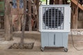 Evaporative Air Cooling Fan. Air conditioning. portable air cooler and humidifier on casters. Mobile air purifier.