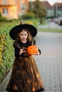 Eve of All Saints' Day. Girl 8-9 years portrays the evil enchantress.