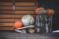 On the eve of Halloween, pumpkins near the house are decorated w