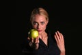 Eve hands YOU an Apple Royalty Free Stock Photo