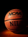 Eveleth, MN - USA - 05-07-2021: An NCAA Final Four basketball with NIL ( Name Image Likeness ) text Royalty Free Stock Photo