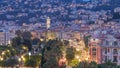 Evening aerial panorama of Nice day to night timelapse, France. Lighted Old Town little streets and Massena square after Royalty Free Stock Photo