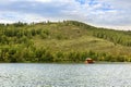 evening on the beautiful Ural lake Teren Kul against the background of the Ilmensky ridge.