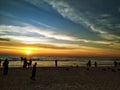 Evening bliss. People relaxing all around soaking the evening golden rays