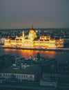 In the evening in Budapest view of the stunning Hungarian government parliament which is beautifully lit.