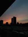 Evening building and city skyline and cars