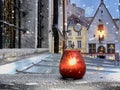 Christmas red candle  decoration on town hall square at sunny snowy  winter day in Tallinn Old town travel holiday in E Royalty Free Stock Photo