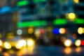 Evening city traffic in a giant metropolis.City light bokeh background.Defocused night traffic lights. Royalty Free Stock Photo