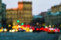 Evening city traffic in a giant metropolis.City light bokeh background.Defocused night traffic lights. Royalty Free Stock Photo