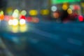 Evening city traffic in a giant metropolis.City light bokeh background.Defocused night traffic lights. Royalty Free Stock Photo