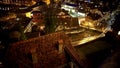 Evening city view, beautifully illuminated old houses, electricity consumption