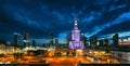 Evening cityscape with city lights - view of the Warsaw downtown and The Palace of Culture and Science Royalty Free Stock Photo