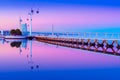 Evening cityscape of Lisbon mirrored in the water, Portugal. View of Park of the Nations Parque das NaÃÂ§ÃÂµes at dusk