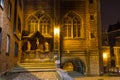 Evening cityscape - view of The Vleeshuis Butchers Hall, or literally Meat House and sculptural group referring to the theme of