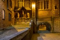 Evening cityscape - view of The Vleeshuis Butchers Hall, or literally Meat House and sculptural group referring to the theme of