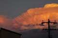 Evening Clouds Glowing Orange Over Suburban Landscape Royalty Free Stock Photo