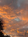 Evening clouds illuminated by the setting sun Royalty Free Stock Photo