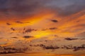 Evening cloudscape. Orange sky.