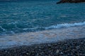 Evening on a coast. Abstract blue closeup on transparent background. Beach vacation. Water splash. Foam water. Liquid