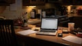 evening computer on kitchen table Royalty Free Stock Photo