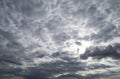 Evening contrast ominous sky with grey and white clouds and sunlights. Dramatic sky Royalty Free Stock Photo
