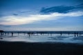 Evening cool look of Murudeshwara beach with dark blue sky and clouds rolling over the sea.