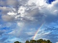 An evening double rainbow between the clouds after a summer downpour, Brienz - Canton of Bern, Switzerland Kanton Bern, Schweiz Royalty Free Stock Photo