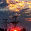 The evening electricity pylon silhouette, it is very beautiful. Royalty Free Stock Photo