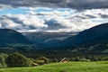 Majestic Oppdal valley in Norway showcasing lush greens and mountain splendor