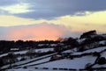 Evening glow over winter snow Royalty Free Stock Photo