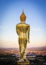 Evening, golden buddha statue in Khao Noi temple, Nan Province Royalty Free Stock Photo