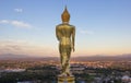 Evening, golden buddha statue in Khao Noi temple, Nan Province, Royalty Free Stock Photo