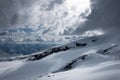 Evening high mountain scenery snow-covered rocky steep mountains of the main mountain range of the northern Caucasus Royalty Free Stock Photo