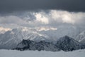 Evening high mountain scenery snow-covered rocky steep mountains of the main mountain range of the northern Caucasus Royalty Free Stock Photo