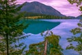 Walchensee, Germany - Evening Hour with Pink Sky, Mountains and Trees on the Shore of the Scenic Walchensee Royalty Free Stock Photo