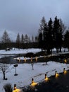 Evening illuminated hanging lantern lamp light in winter time. Germany near city Sayda