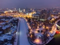 Evening illuminated Kharkiv city river aerial view