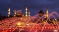 The evening illumination of fountain and Blue mosque with mahya