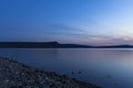 Evening landscape of river nature scenic view and hill land background long exposure photography in twilight lighting Royalty Free Stock Photo